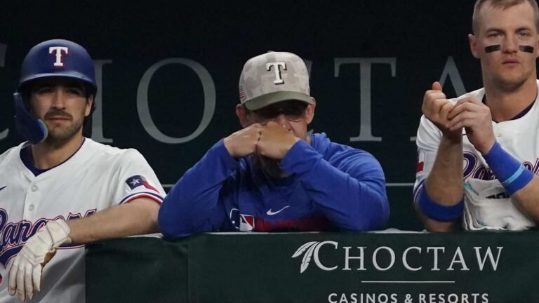 Texas Rangers hitting coach Bret Boone in the dugout